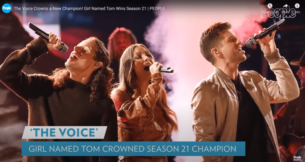 An area trio is the First to ever win on the Voice as a Trio Singing Group. The Band is A Girl named Tom.