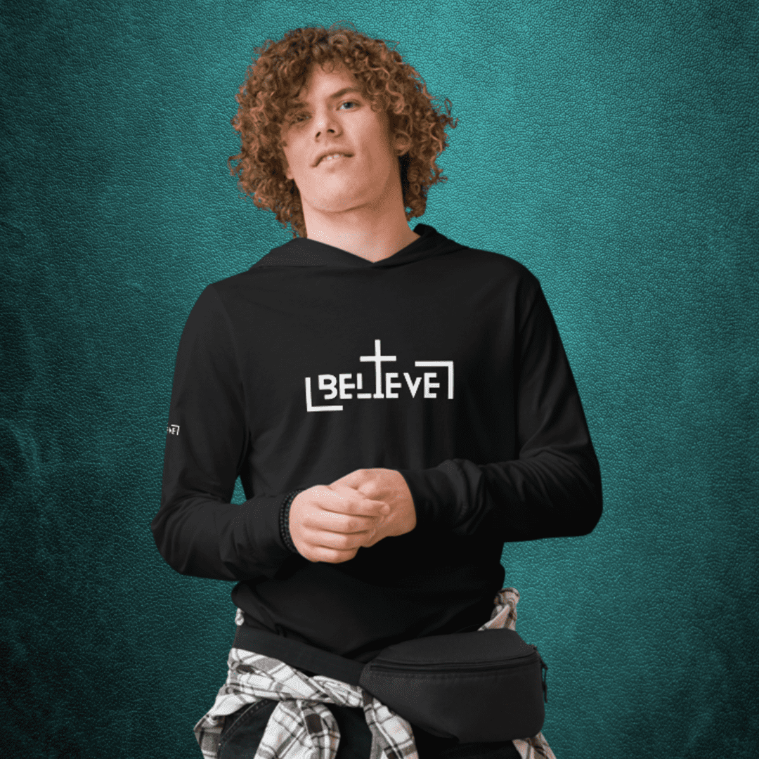 Man wearing a black "Believe" hoodie.