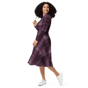 A woman in an All-over Print Long Sleeve Midi Dress, in Celtic Burgundy and Black Plaid.