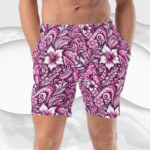 Man wearing floral print shorts.