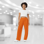 Woman in orange pants and white top.