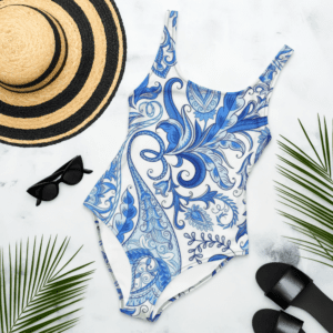 Blue floral print swimsuit with white background.