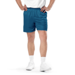 Man wearing blue athletic shorts and white shoes.