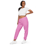 Woman wearing pink sweatpants and a white crop top.