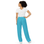 Woman in white shirt and blue pants