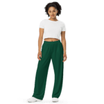 Woman wearing green pants and white shirt.