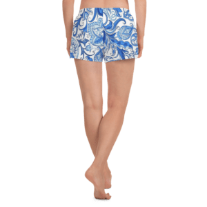 Woman wearing blue floral shorts.