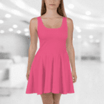 Pink sleeveless skater dress on a model.