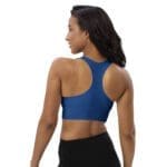 Woman in a blue sports bra, back view.