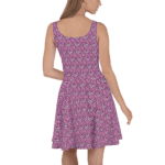 Woman wearing a pink floral dress.