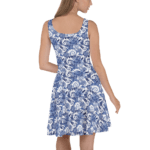 Woman in blue and white tie-dye dress.