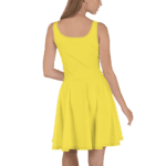 Woman wearing a yellow sleeveless dress.