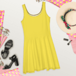 Yellow sleeveless skater dress with black shoes.