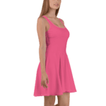 Woman in a pink sleeveless dress.