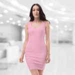 Woman wearing a pink sleeveless dress.