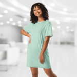 Woman wearing a mint green t-shirt dress.