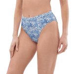 Woman wearing blue and white patterned bikini bottoms.