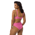 Woman wearing pink bra and underwear.