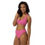 Woman wearing a pink bra and underwear.