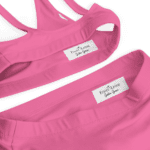 Pink sports bra with brand tag.