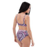 Woman in paisley print bikini swimsuit.