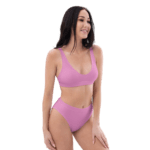Woman in a pink bikini top and bottoms.