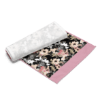 Floral fabric with pink trim and white fabric.