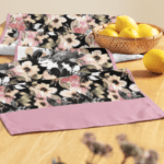 Pink and black floral table runner.