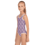 Girl wearing paisley patterned swimsuit.