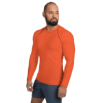 Man wearing an orange long-sleeve shirt.