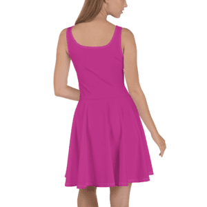Woman wearing a pink sleeveless dress.