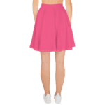 Pink skater skirt with white sneakers.