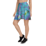 Woman wearing tie-dye skater skirt and sneakers.