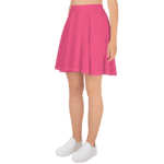 Woman wearing a pink skater skirt.