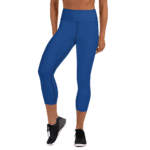 Woman wearing blue high-waisted leggings.