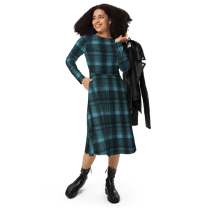 Woman wearing a blue plaid dress and boots.