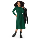 Woman in green dress and black boots.