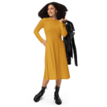 Woman in yellow dress with black jacket.