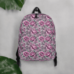 Pink floral backpack with paisley design.