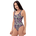 Woman in a purple butterfly swimsuit.