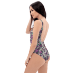 Woman in a floral print swimsuit.