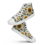 White high-top sneakers with sunflower pattern.