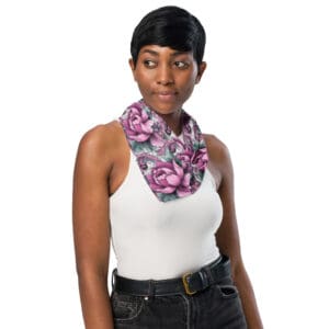 Woman wearing a floral patterned scarf.