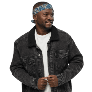 Man in a black denim jacket and bandana.