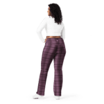 Woman in plaid pants and white shirt