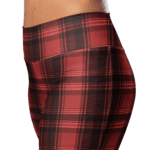 Red and black plaid leggings on a woman.