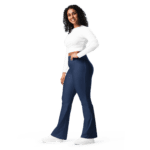 Woman in white shirt and blue bell bottoms.