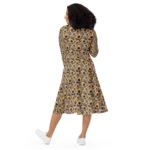 Woman in sunflower print dress from the back.