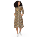 Woman wearing a sunflower dress.