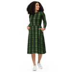 Woman wearing a green plaid dress.